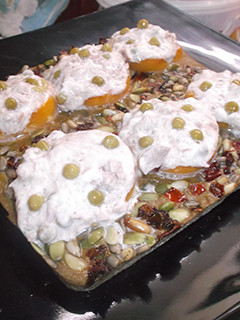 Una foto de Pizza de melocoton con atún