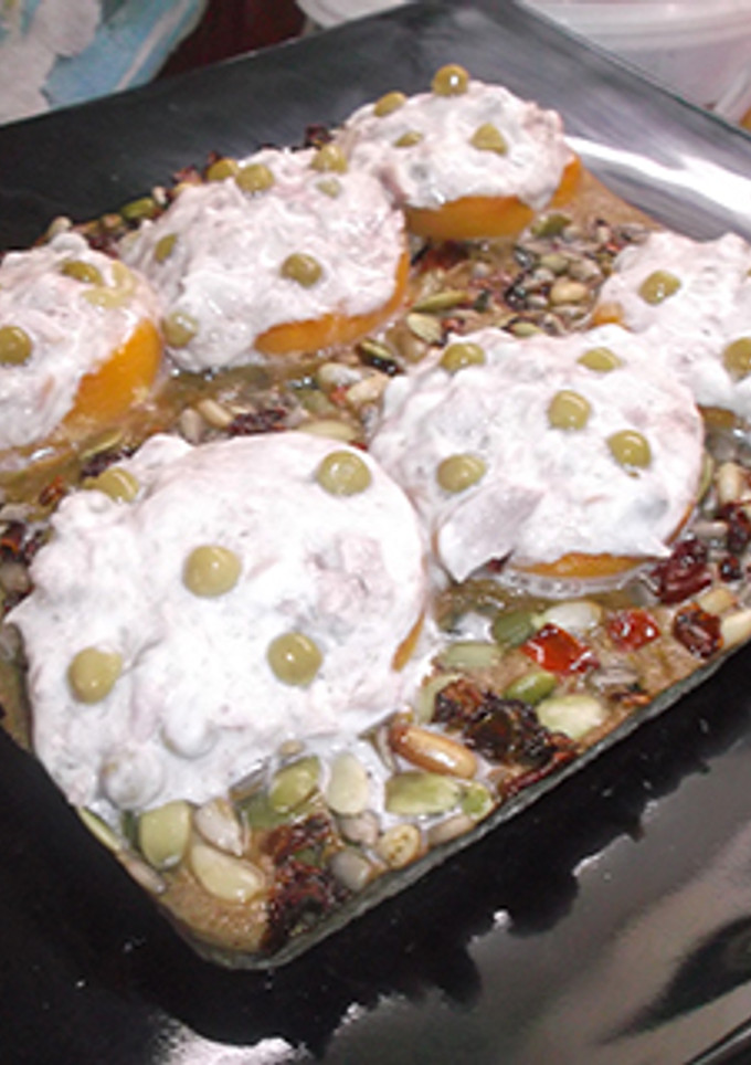 Una foto de Pizza de melocoton con atún