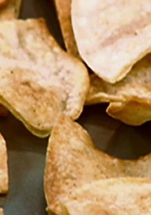 A picture of Game-Winning Guac' with Fresh Baked Tortilla chips.