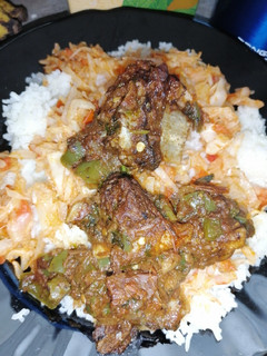A picture of Rice with chilli beef and cabbage.