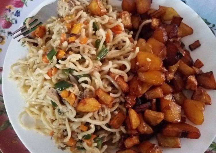 Fried Indomie with fried Plantain and Irish potatoes