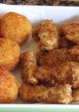 Foto principal de Bolitas de arroz rellenas de mozzarella y jamón hilado
