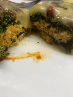 Una foto de Canelones de espinaca rellenos de calabaza y ricota