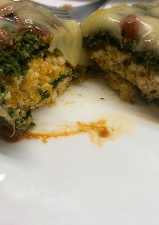 Una foto de Canelones de espinaca rellenos de calabaza y ricota