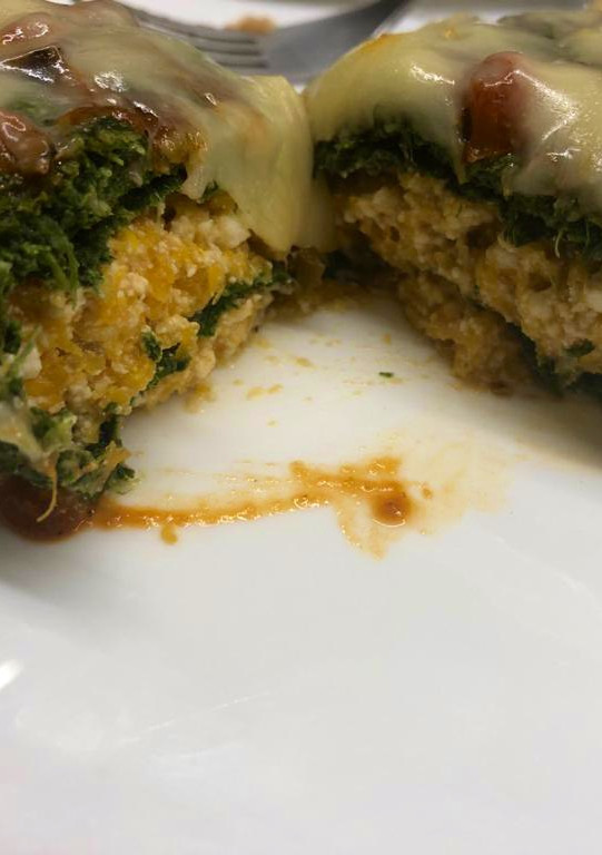 Una foto de Canelones de espinaca rellenos de calabaza y ricota