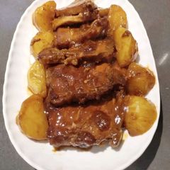 A picture of Ribs with Potato.