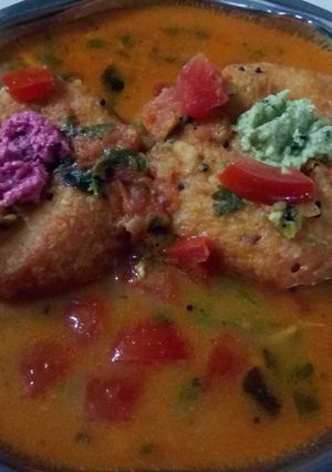 A picture of Tomato rasam vada.