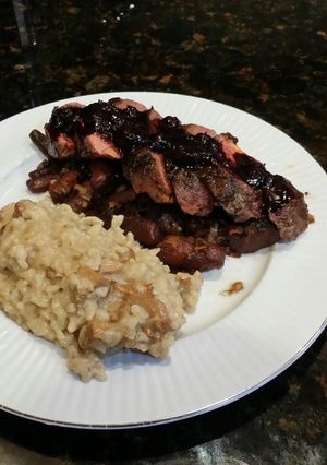 A picture of Brad's seared duck breast w/ blueberry balsamic reduction.