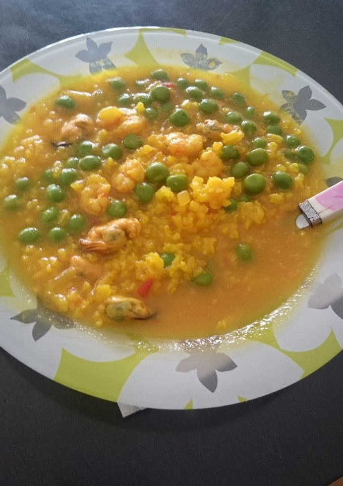 Una foto de Sopa de arroz con gambas