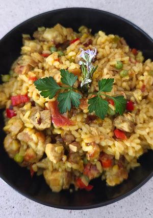 Una foto de "Paella" de cerdo