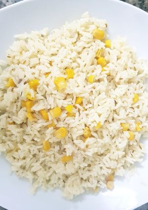 Una foto de Arroz con maíz muy fácil y muy rico 😋