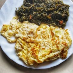 Managu with fried egg A picture of Managu with fried egg.
