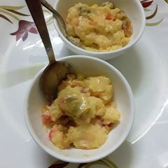 A picture of Custard with tutti fruities and mango jelly.