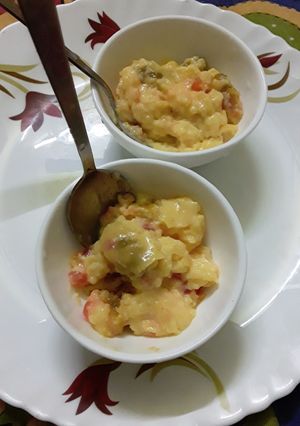 A picture of Custard with tutti fruities and mango jelly.
