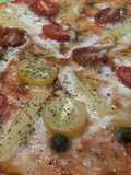 Pizza de cherrys y choclitos