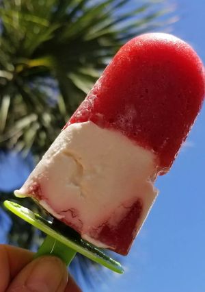 A picture of Strawberries and Cream Popsicles.