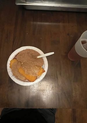 A picture of Baked Crunchy Tilapia with Refried Beans.
