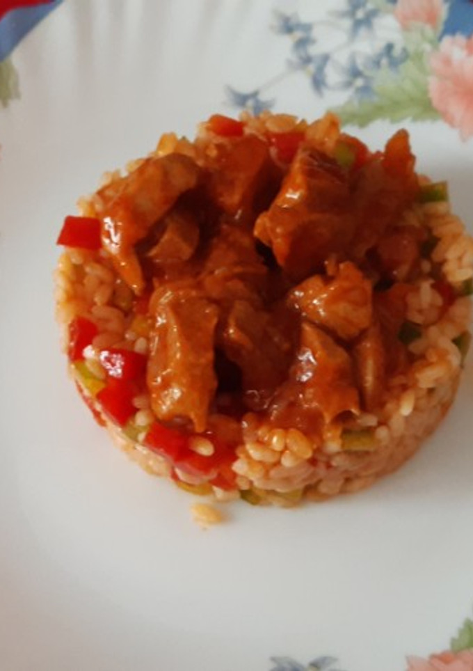 Una foto de Ensalada de arroz con calamares a la americana en conserva