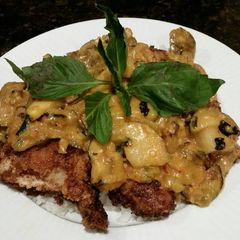 A picture of Brad's fried chicken with thai panang curry sauce.