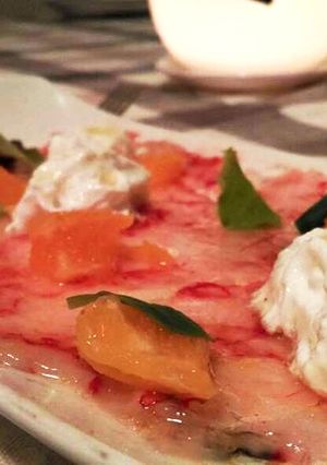 A picture of Red Shrimp Carpaccio with Burrata and Pink Grapefruit.