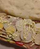 "Completo de Mila con pan de pizza a la Pela Man"
