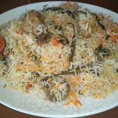 A picture of Hyderabadi kachay gosht ki biryani.