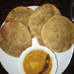 A picture of Peas kachori with chana dal.