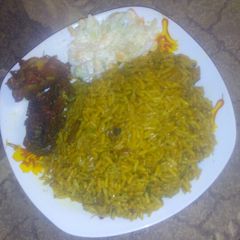A picture of Fried rice wt soy sauce.