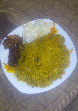 A picture of Fried rice wt soy sauce.