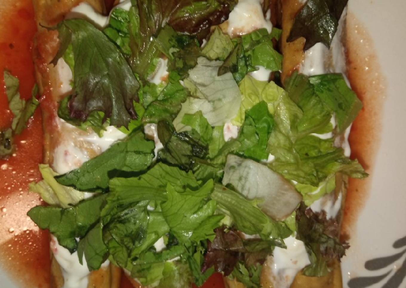 Taquitos de pollo ahogados en caldillo