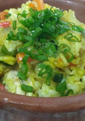 Una foto de Wok con pollo y arroz