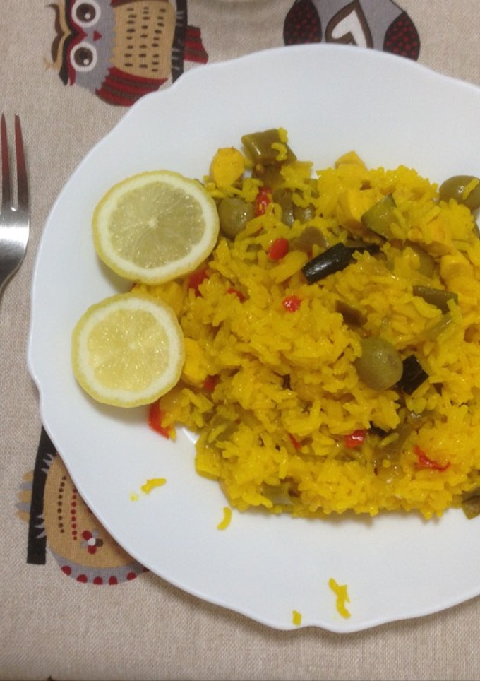 Una foto de Arroz a banda