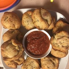 A picture of Pepperoni and sausage cheese bombs.