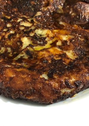 Una foto de Frico friulano (tortilla de queso y papa)