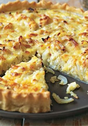 Una foto de Quiche de puerros o de bacon y queso o de jamón y queso…