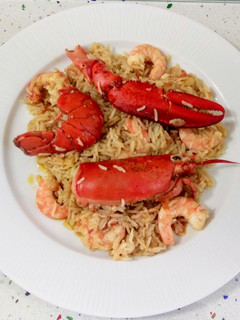 Una foto de Arroz meloso con bogavante y langostinos