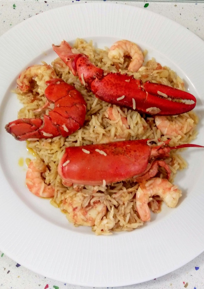 Una foto de Arroz meloso con bogavante y langostinos