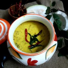 A picture of Kumbalangha Moru curry onam sadhya puliserry onam dish.