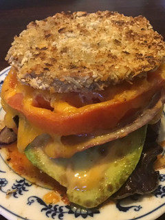 A picture of California Farm Veg Eggplant Cheese Burger.