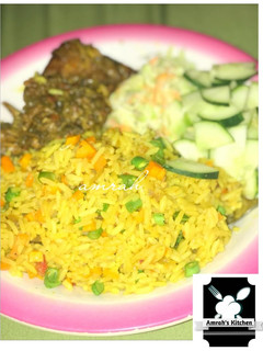 A picture of Yellow jollof rice.