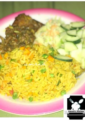 A picture of Yellow jollof rice.