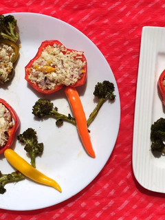 A picture of Baked capsicum with paneer and broccoli.