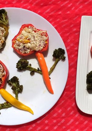 A picture of Baked capsicum with paneer and broccoli.