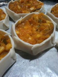 Una foto de Canastitas de Calabaza, Choclo, Berenjena y Queso! Vegetarianas!
