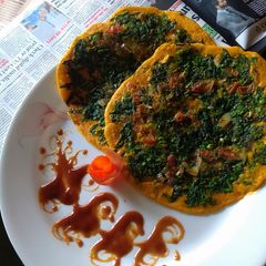 Spinach veg omelette A picture of Spinach veg omelette.