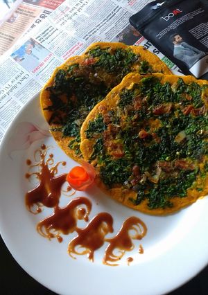 A picture of Spinach veg omelette.