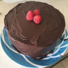 A picture of Vanilla Cake with Chocolate Frosting.