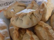 Una foto de zucchini empanadas