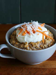 A picture of Carrot Cake Oatmeal with Coconut Yogurt Topping (plant-based).