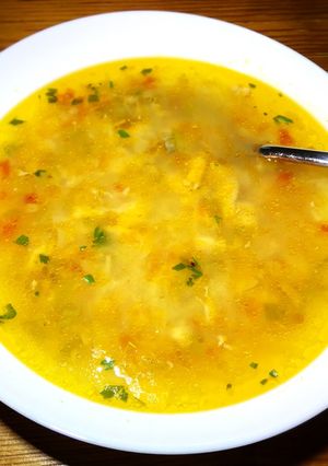 A picture of Salmon Head and Skeleton Soup with Noodles.